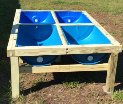 How to Build a Simple Raised Bed from Plastic Barrels — Our Experience Growing Leafy Greens Early